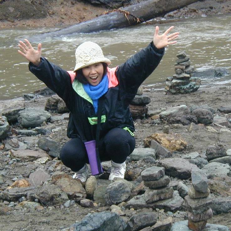 Kim stacking stones at Tennessee Valley Cove in 2002
