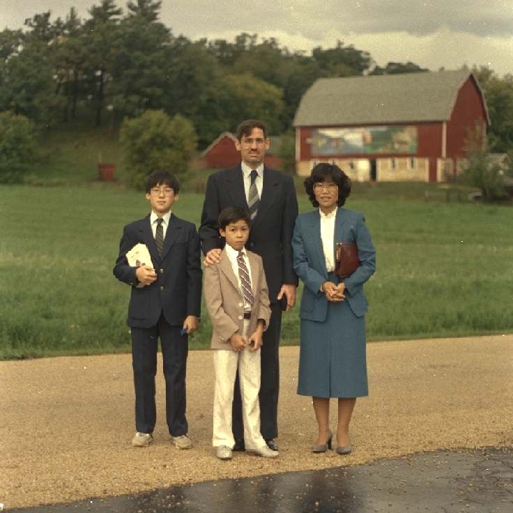 Family at front of house in Tomah / 1987
