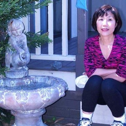 Kim on stairs at Mill Valley house (with Emily)