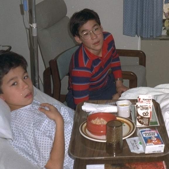 Simon in La Cross Hospital with Zac ~ 1988