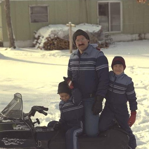 Chris with boys on Snowmobile in Mauston ~ 1985